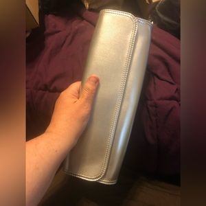 Sliver clutch purse from Gap. Never used perfect for prom or a wedding.